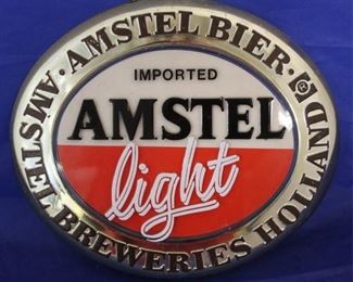 139 - Amstel Light Plastic Sign 8 1/2 x 8
