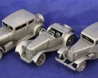 209 - 3 Danbury Mint pewter cars
