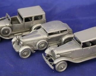 210 - 3 Danbury Mint pewter cars
