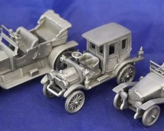 211 - 3 Danbury Mint pewter cars
