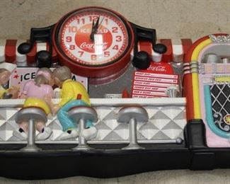 298 - Coca - Cola plastic clock 11 x 22
