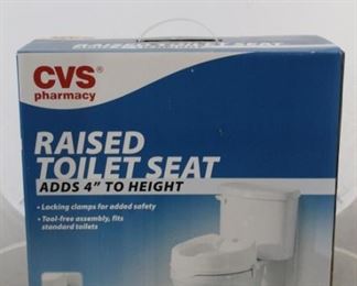 372 - CVS brand raised toilet seat in box
