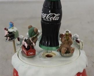 512 - Coca - Cola wind up musical bottle figure
