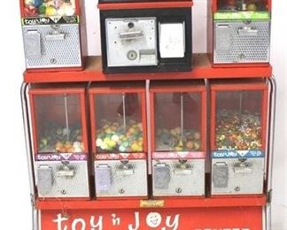 547 - Toy N Joy Center candy vending machine 48 1/2 x 28 x 15
