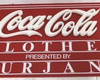 574 - Coca - Cola Clothes plastic sign 26 1/2 x 46
