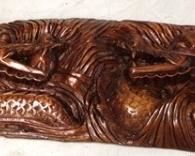 605 - Carved wood dragon plaque 11 x 50
