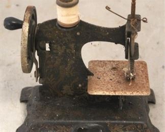 714 - Antique salesman sample sewing machine
