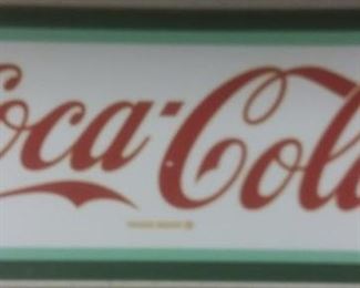 3484 - Coca Cola Sign - metal in wood frame 10 1/2 x 26
