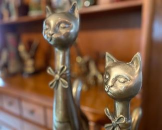 Large brass cats