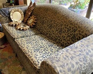 Leopard print upholstered sofa