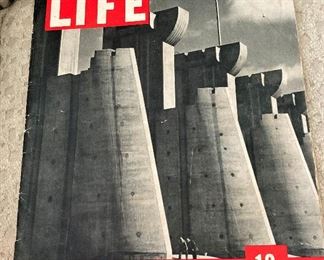An issue of the first pictorial  Life Magazine - Nov. 23, 1936 (It featured a cover of the Fort Peck Dam's spillway.) 