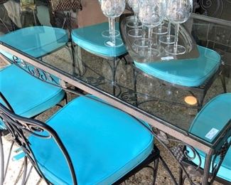 Coordinating glass top table and chairs