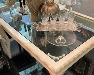 Glass top dining table will seat 6-8 people