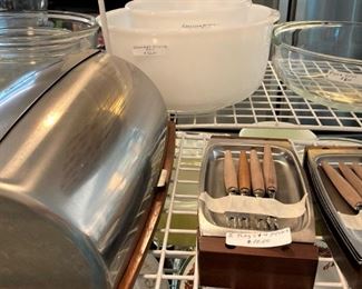 Bread keeper; trays and wooden handled forks; mixing bowls