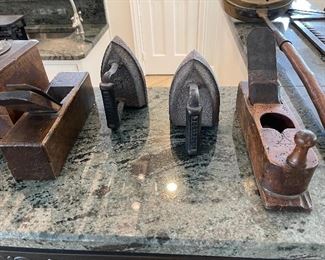 Antique tools
Cast iron doorstop
Cast iron irons