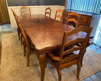 Country French Walnut Dining Table w 2 Leaves.  With scalloped  edges and a panel patterned top, this table elegantly expands with 2 leaves to accommodate all of your dinner guests.