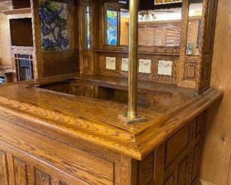 Impressive Oak Home Pub Bar with Brass Rail & Column, Stained Glass Panel, decorative touches galore.