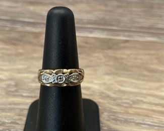 14k Gold Ring with two small diamonds is missing main stone Size 6 total weight is 2.89 grams has small split in ring from age engraved with happiness