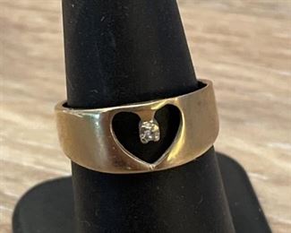 14k Gold Diamond Ring size 7 weighs 3.84 grams and the back is cut