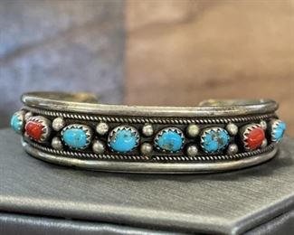 Sterling cuff bracelet set with turquoise weighs 15.17 grams