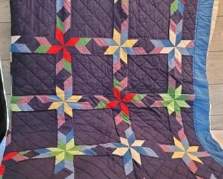 Starburst Quilt is partially hand stitched