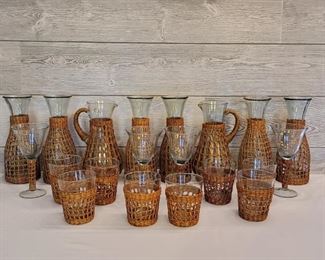 Vintage Barware Set Clear Glass Encased in Wicker
6- Wine carafe, 2- pitchers, 4- wine glasses, 8- cocktail glasses