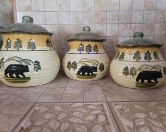 (3) Hand Painted, Lidded Ceramic Canisters.  Tallest is 8in 