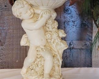Dramatic Faux Flowers in Bisque Cupid Vase                 Has the effect of the Cupid offering you flowers would adorn the most lavish entry
15in to top of  vase and 37in to top of flowers