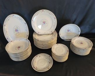 Dynasty China Set-Melody Coupe, 12 Place Settings This pattern was discontinued in 2006. 
12 place setting, 1 platter, 1 serving bowl (no cups) 1 dinner plate has a mchip
Heads up - this is a reproduction of the much more expensive Wedgwood Rosedale Pattern (missing blue rim this set)   