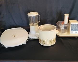 (4) Kitchen Appliances incl George Forman Grill + Kitchen Aid blender, Rival crock pot, Hamilton Beach food processor.  Grill, blender & crock pot all work.   Could not get the bowl lined up on the food processor to test.  