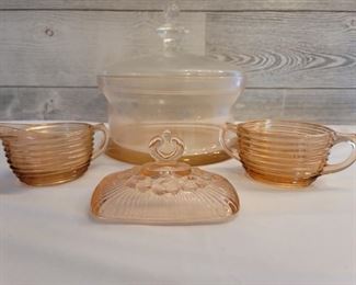 (6) Pink Depression Glass Domed Cake Plate,  Creamer and Sugar and Covered Butter Dish.  
Dome on plate is clear glass