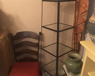 Obelisk like designery metal & glass shelf.