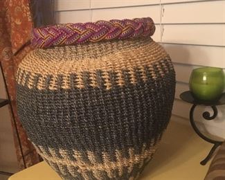 Woven basket, pretty large. Guaranteed snake free...
Just in case you were worried.