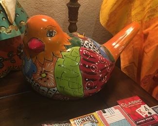 This Mexican hand-painted ceramic bird does not appear to have appreciated my sales strategy on the green things last picture. 