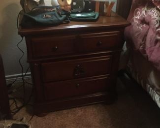 Part of a 4 piece bedroom set... gorgeous bed, 2 side tables, and dresser with mirror.