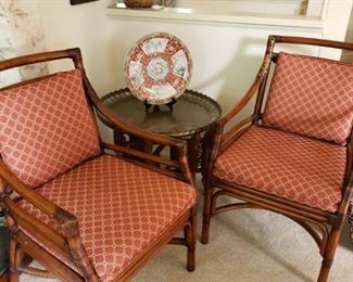 Rattan chairs and Brass top Camphor based table with chargers