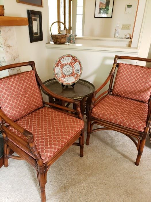 Rattan chairs and Brass top Camphor based table with chargers