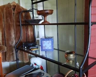 bakers rack with a wine rack below