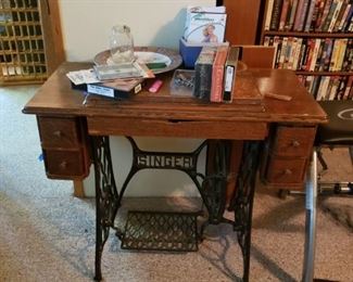 old Singer sewing machine with iron base