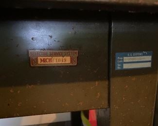 Selective service tag on a vintage desk work table 
