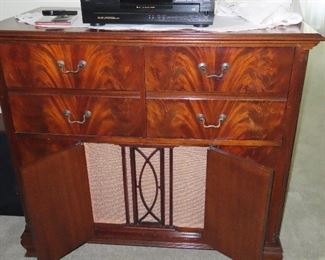 Speakers inside cabinet.