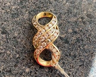 Gold and diamond pendant