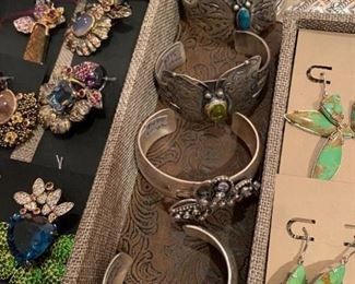 Sterling silver jewelry by some of the finest Native American Navajo artists in New Mexico with genuine stones where applicable. All 50% off!