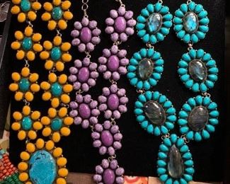 Statement cluster necklaces from Tibet with genuine stones. The metal is silver with a touch of brass mixed in to retard tarnishing. Get the look for less. All 50% off!