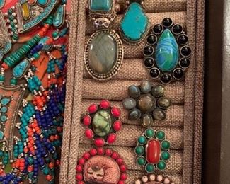 Statement rings from Tibet with genuine stones. The metal is silver with a touch of brass mixed in to retard tarnishing. Very comfortable to wear. All 50% off!