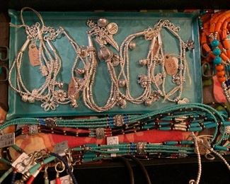 Fine silver bracelets from Thailand. The silver ranges from .960 to .999 pure. Also, affordable necklaces from Tibet. All 50% off!