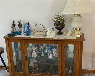 Lighted Curio Cabinet, Glassware, Bells, Touch Lamp and more 