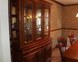 Virginia House china cabinet with leaded glass. 20" deep, 56" wide, 83" tall. 2 shelves, 2 drawers, 2 doors