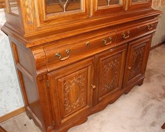 Solid oak, matches oval table