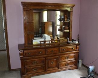 Vanity style low boy dresser with large attached mirror unit